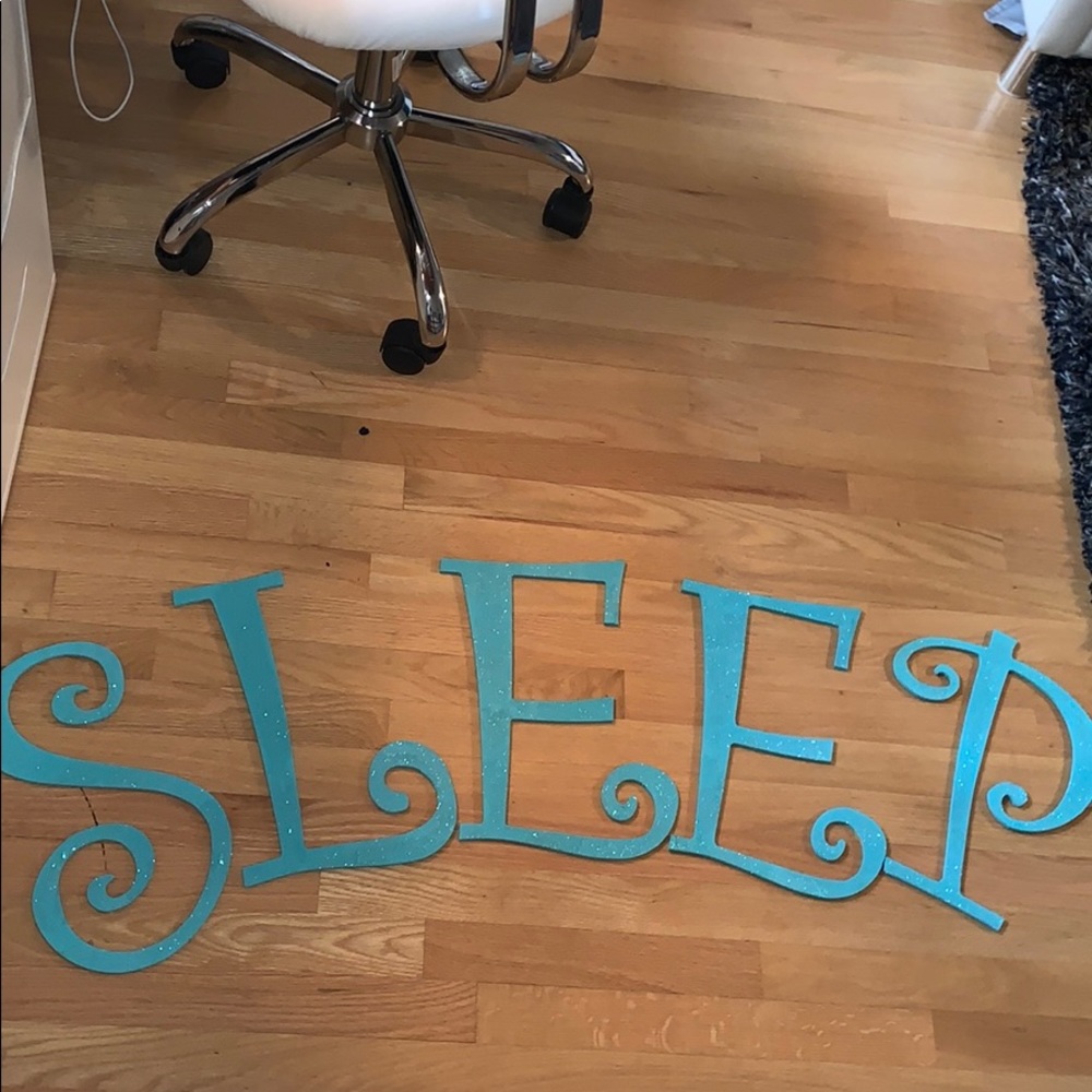 sparkly teal "sleep" wall decor